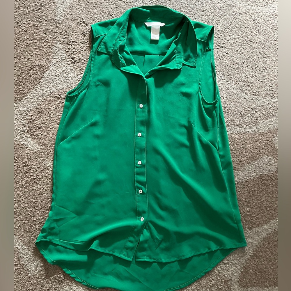 Green sleeveless button up blouse